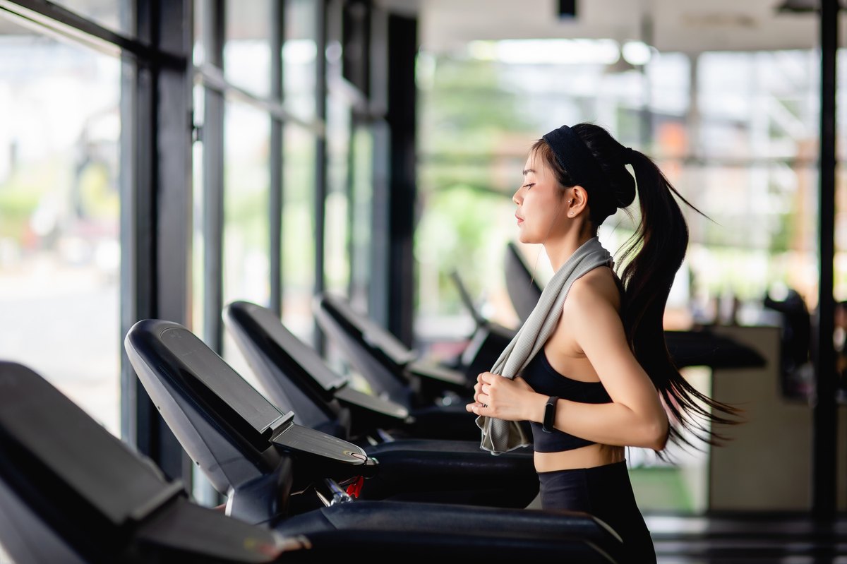 Resident using the on-site fitness centre