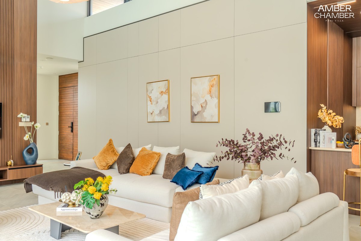 Amber Essence lounge seating beside the garden windows